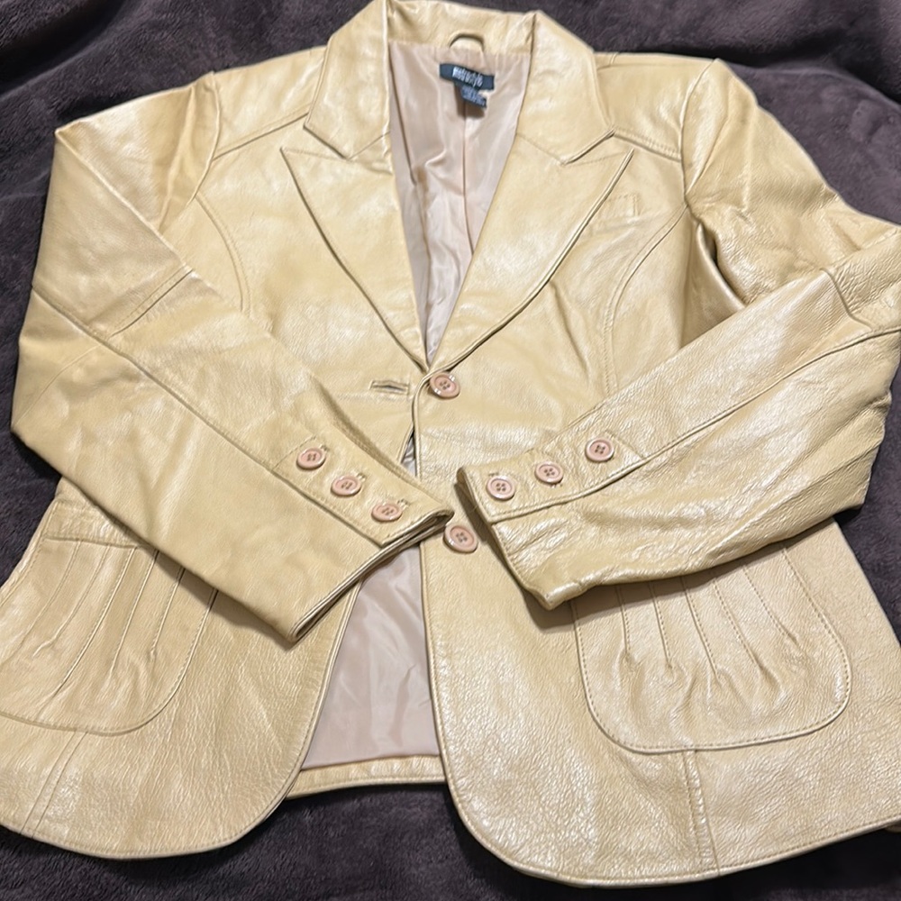 MetroStyle goldish tan leather jacket. Women’s size 14.